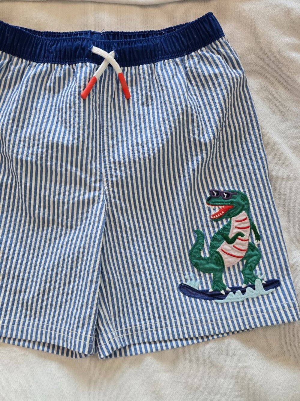 8-9Y Mini Boden Boys Swim Shorts - Blue White Stripes with Dino
